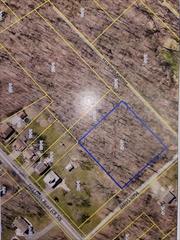 Private wooded setting on a private road close to Middletown amenities. Buyer is responsible for all necessary municipal approvals.