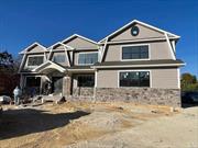 ALMOST COMPLETE - Enter This Majestic Home Through Oversized Double Doors Into A Bright Vaulted Foyer Welcomed By A Dramatic Bridal Staircase And 10 Foot First Floor Ceilings! This Home Also Features A Gourmet Eat In Kitchen, Formal Living Room & Formal Dining Room W/Coffered Ceiling, Oversized Family Room W/Fireplace & Sliders To A Rear Yard That Is An Entertainer&rsquo;s Dream! Soak In The Beautiful Acre Of Privacy, Nature & Mature Landscape. Radiant Heated Flooring In Master Bath, 3 Car Garage, 10&rsquo; Basement Ceiling, Finished W/ Outside Entrance! Guest Suite On The1st Floor Can Be Anything You Wish...Home Office, Additional Fam Room, Library, Guest Quarters ...There Is No Need To Leave This Home For Entertainment! Plenty Of Room For A Pool & Firepit! Now Is The Time To Customize As You Wish...Photos for Workmanship Only