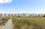 Ocean front Yardarm condominium featuring 2 bedrooms, 2 full bathrooms and an open floor plan with a full kitchen, bright sunny living room and plenty of closet space. The deck is set up for outdoor dining or lounging with breathtaking views of the ocean. The Yardarm condominium includes: lifeguarded swimming pools located on both the bay and the ocean, tennis courts, elevator, storage for bikes and kayaks, daily full time management and reserved parking. Only a short distance into town for shopping and restaurants. Available 2025: July $16, 000; September call for pricing