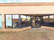 A stunning first-floor storefront space with excellent visibility and exposure, strategically located on the heavily trafficked Sunrise Highway, close to all major transportation, easy and convenient parking, suitable for any type of business, one large room with two additional rooms /offices, a kitchenette, and an overhead door in the back. Immediately available