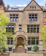 Indulge in the allure of 842 Carroll Street, a residence that transcends the ordinary and beckons those with a penchant for luxury. As you enter this architectural masterpiece by Charles Pierrepont Henry Gilbert, you&rsquo;re welcomed into a world of brilliant artistry, designed by one of the giants of the Gilded Age. Nestled beside prestigious Prospect Park in Park Slope, one of Brooklyn&rsquo;s most upscale enclaves, this Roman Stone and granite townhouse stands as the epitome of grandeur. This property features 18 rooms, including 12 bedrooms and 9 bathrooms, with dimensions that exceed expectations: approximately 33 feet wide, a staggering 7, 700 square feet of interior space spanning a 75-foot lot, complemented by an additional 1, 275 square feet of outdoor space. This residence is unmatched in its magnificence. The garden floor unveils a renovated two-bedroom, two-bathroom guest apartment adorned with a fireplace and triple sliding doors leading to a spacious two-tiered private backyard. Upon entering the parlor floor, you are greeted by a 15&rsquo; by 24&rsquo; gallery entrance, featuring a massive mahogany fireplace, a grand staircase, and a hidden powder room. The living room and dining room have over eleven-foot ceilings and are flooded with natural light from a glorious south-facing bay window and oversized windows to the north and south. Original wood burning fireplaces in each room become the centerpiece, with oak wood-paneled walls and Brazilian mahogany herringbone floors in the living room adding to the grandeur. The modern kitchen has a beautiful south seating area surrounded by windows inviting views of townhomes, trees, and the garden below. The clouds extend into the room with a captivating ceiling painting by renowned artist Richard Cortez, setting the stage for a home that is not just lived in but experienced. Ascend to the third floor, where four bedrooms, three fireplaces, and two bathrooms display the richness of mahogany, cherry, and oak materials used throughout the home. A Brazilian hardwood and copper-clad exterior deck faces south from your primary bedroom suite, with a windowed dressing room and an enormous primary bathroom. The fourth floor continues the narrative of luxury with sun-filled rooms, laundry facilities, and two fireplaces. There are multiple bedroom options, and flexibility for multi-functional spaces whether it&rsquo;s an executive office with an en suite bathroom, playroom, gym, library, or sunroom. The fifth floor crowns this architectural marvel with a separate two-bedroom loft apartment. It boasts original beams, a 12-foot ceiling height, a fireplace, a full kitchen, a large balcony, and a skylight, offering a sanctuary, artist&rsquo;s loft, or staff residence that goes beyond the ordinary. Impeccably crafted structural steel and stunning copper cladding attest to the highest quality of construction. Central air conditioning, a recent silver-coated roof, and a boiler less than a decade old help ensure comfort and longevity. This property is more than a residence; it&rsquo;s a testament to your discerning taste, and every detail echoes unmatched luxury. Introducing 842 Carroll Street - a fusion of artistry and lifestyle, where opulence knows no bounds. This is a co-exclusive with CORE Group Marketing.