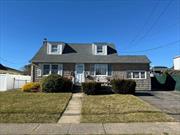 Expanded cape with so much potential located in very desirable area with Plainedge Schools. Features new roof, new oil tank, sewers, finsihed basement with outside entrance, detached 1.5 car garage and so much more. Needs updating.