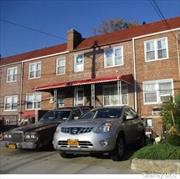 attached, 3 br brick colonial with private driveway . Convenient to shopping and transportation