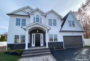 **TO BE BUILT**Beautiful 5 Bedroom, 4.5 Bathroom Colonial in N Syosset! 2 Story Entry, 9FT Ceilings, Formal LR & DR W/Coffered Ceiling, Den W/Fireplace, Kitchen W/Quartz Counters, Prof SS Appliances, Mud Rm, Hardwood Floors, Custom Millwork, 2 Zone CAC, IGS, 2 Car Garage **Pictures Shown Are For Workmanship Only**