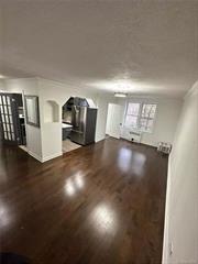 Beautifully renovated Large 1 Bedroom/1 Bath Coop apartment. Located on the Rego Park/Forest Hills Border. 750 sf. apartment with many large and spacious closets. Easy access to street parking as well as an Indoor Garage (waitlist), a Live-in Super, New Elevator, Camera and phone app integrated intercom, and modern Laundry Room. The Monthly Maintenance includes all utilities (Taxes, Heat, Hot Water, Gas and Electric.) Open Concept with a large Living Room and Dining Area, this apartment has windows in every room, sound proof Floors , an updated Kitchen and jacuzzi Bathtub. The kitchen includes a double Quartz Marble countertop and backsplash with a full sized Dishwasher, Stove, and large Stainless Steel Refrigerator.