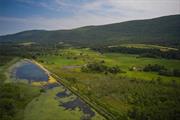 Boston Corners Farm. Estate parcel with incomparably beautiful panoramic views of the Upper Harlem Valley. Conveniently located near the trend setting Hamlet of Millerton NY. Views are almost entirely protected by federal, state and Columbia Land Conservancy properties that make up the Berkshire Taconic Mountain Range and the Harlem Valley Rail Trail Corridor. Walk, bike or drive to Bash Bish Falls, Catamount Ski Area, Hudson, Great Barrington and all the outdoor recreational, artistic, and cultural amenities that make the greater Hudson Valley region one of the most strategically sound and enjoyable place to live in the Western Hemisphere. Rarely does an opportunity such as this present itself.