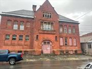 former school building redevelopment opportunity. This solid brick 16, 000 sq. ft. commercial building Property contains 8 large classrooms and 2 smaller classrooms. Potential for indoor storage, professional offices, 8-10 condos or apartments. 285 24th St Watervliet, NY 12189 post office is in Watervliet, county is Albany county