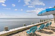 Waterfront Paradise at Peconic Bay Beach Cottage Stylish beach cottage, with stunning water views overlooking Peconic Bay . Newly renovated with a sophisticated beach vibe, 3 bed and 1 bath with eating and lounge areas overlooking the water. - Sandy dock to launch your kayak, go for a daily swim or meditate at water&rsquo;s edge - Wood burning fireplace for cool evenings in the late Summer & Fall - Outside shower - Central air /heat on ground floor - Please note there is a lightly used association &rsquo;right of way&rsquo; to the water to the left of the property.