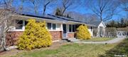 Welcome to this fully renovated 5-bedroom, 3-bath ranch on a large prime corner lot close to the train, school and shopping, and in a desirable and safe neighborhood of Hampton Bays. Landscaped grounds and a 2-car garage with a full bath.  The main floor features a sunny living room that flows directly into the kitchen/dining area with direct access to a spacious outdoor deck, as well as 4 bedrooms, 2 baths and a home office. The lower level has a bedroom, bath, gym, laundry room and storage. 34 Nassau embraces a sustainable lifestyle, with vegetable planting beds and rooftop solar panels. The detached garage also includes a workstation for your hobbies. Rental permit in place.