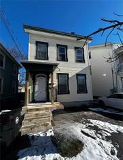 Welcome to your cozy retreat in the heart of Poughkeepsie, NY! This charming 2-bedroom, 1-bathroom home nestled on the first floor of a tranquil cul-de-sac offers a perfect blend of comfort and convenience. Step inside to discover a large eat in kitchen! The spacious living areas feature easy-to-maintain vinyl flooring, ensuring both style and durability. Conveniently located near shops, restaurants, and public transportation, this residence is ready to welcome you home sweet home.