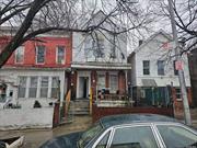 Legal 2 Family. 2-Story house Nestled in the charming neighborhood of East Elmhurst! Offering, 4 bedrooms, 2 baths. Sold AS IS