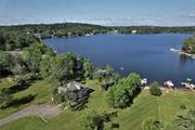 It is all about the lake! This custom-built lake house offers plenty of room for all in an amazing location on White Lake, one of the most pristine, clean and popular motorboat lakes in the area. The expansive open plan takes full advantage of the lake views, glorious sunsets and the outdoor spaces. First floor contains the spacious main entrance (used as a sitting room), island kitchen with granite, dining area, living room, two BR&rsquo;s, full bath and large sunlit flex/game room space as well as laundry. Upstairs offers six more bedrooms, two ensuite with a shared balcony overlooking the lake, and a third full bath. Property boasts beautiful front and rear yards, large lake frontage and .94 acres! This property is an active short term rental and has been operating successfully for three years adding to the value. Premium location only minutes to Bethel Woods Center for the Arts and Museum with world class entertainment, waterfront dining, antiquing, and Smallwood Forest Preserve (for over 100 acres of hiking). Home of the original 1969 Woodstock Festival, Bethel is the place to be!