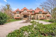 Surrounded by an enviable landscape, and embodying an elegant Mediterranean architectural design, this property is a hidden gem tucked away from the hustle and bustle of everyday life in the Village of Sands Point. As first impressions go, this home raises the bar. Lavish design details run through this 5-bedroom European-inspired estate: think two-story foyer centered on a broad, elegant staircase; think wrought iron balconies adding architectural interest to the home&rsquo;s facade while extending its living space; think of every resort amenity you desire and you will find it here, from a roof-top terrace from which to steal a glimpse of the Long Island Sound, to the infinity-edge pool and spa surrounded by terrazzo patio with inlaid sun motif, to the indoor pool with sensational colored lights and resistance-current. As if this was not enough, the home offers a complement of features second to none including a sports court, a summer kitchen, a gazebo with outdoor television, a pond with waterfall, a greenhouse, a full gym, a game room, a sauna, a steam room, a library, a home office, a workshop and more. The home&rsquo;s exquisite gardens span a shy 3.5 acres and include a seemingly endless array of rare specimen rhododendrons which have provided decades of enjoyment to their fortunate owners. For comfort and convenience, there are various smart features, a full-house generator, heated driveway, and an elevator to all levels. The property is entirely fenced and gated., Additional information: Appearance:STUNNING, Interior Features:Marble Bath, Separate Hotwater Heater:Yes