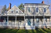 Historic charm, modern comfort. This historic country home has been updated for today&rsquo;s modern lifestyle, while keeping all the charm of years gone past. Great location next to a Nature Preserve, and the Beach right down the road. The first floor is the gathering area with a well appointed kitchen and gas stove for cooking. There is a lovely Sunroom off the kitchen for reading or relaxing. The powder room is right off the kitchen with direct access to the outdoors and pool area. The formal dining room can accommodate 8+ comfortably. The living room has a cozy fireplace, large TV with Nintendo Wii, a pool table and piano. Upstairs there are four bedrooms. The Main bedroom has a King size bed and its own ensuite bathroom with heated floor. The 2nd bedroom also has a king size bed an TV. The 3rd bedroom has a Queen size bed and TV, while the 4th bedroom is oversized with 2 Queen beds and TV.There is a shared Spa like bathroom with seperate Jacuzzi tub and shower, also with a radiant heated floor. Laundry is on the 2nd floor for convenience. Up on the 3rd floor you will find an exercise are complete with a rowing machine, exercise bike and free weights. An oversized bonus playroom is complete with another large TV, board games, and a twin bed with trundle. For additional fun the Barn has an INDOOR 1/2 SKATING RAMP, complete with sakte boards and safety equipment. Need more? How about darts, foosball and ping pong tables. Bikes and helmets for both adults and kids, paddle board, beach chairs, pool toys and tennis racquets. All included! Tired of the beach? Then come play in the heated inground pool with soothing waterfall. Dine outdoors under the pergola with Webber grill and afterwards, relax at the firepit. Close to Beaches, Wineries, Farmstands, Aquarium, Dining and all the North Fork has to offer. Your country summer awaits!