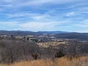 A short 5 minute drive from the Taconic State Parkway, tucked up on a mountainside with incredible far-reaching panoramic views of the Catskills and the Hudson Valley. Untouched and unencumbered, this former farmland has no archaeological issues or no endangered species. Stone walls, a serene pond and gentle slopes. Ready for building. Divided into 7 lots (6 of which are buildable) of varying sizes. Sell off the lots one by one, or keep the full 66 acres as a private retreat. Only 2 Hours from NYC, 15 minutes from Hudson, NY and 20 minutes from Great Barrington, MA.