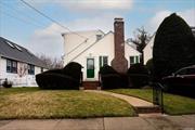 Beautiful Cape in the heart of Malverne Village. Gleaming newly refinished floors add to the charm of this 4 bedroom 3 bath home. There is a extra large eat in kitchen which boasts tons of cabinet space. The quaint fire place in the living room is a feature that fits with the over all coziness of the home. Add some personal touches and make this house your own.