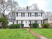 This timeless home captures the warmth and feeling of home. Featuring a large living room with French doors to a screened in porch with access to rear yard. Formal dining room, den, sunny and bright eat-in kitchen. The second floor boasts 4 bedrooms including a primary suite with dressing room and bath, 3 additional bedrooms and full bath and a walk-up third floor is a bonus. Full basement with 2 sides, one with fireplace and the other with washer/dryer area. Hardwood floors throughout the home adds warmth. The property is beautiful with a 2 tiered grass area with lots of space for recreation. Long driveway to accommodate many cars. Beacon Hill is one of the most sought after areas in Port Washington due to the convenience of being close to town, train and schools. Beach rights with fee.