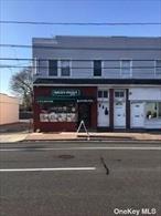 Great location Mixed used property, Front store Deli plus upstairs 4 Bedrooms, Living Room, EIK, 1 full bath Apartment. 1250 SF each Unit. Business Deli is leased (10 Years), 4 Parking spaces.