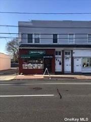 Great location Mixed used property 4 Bedrooms, Living Room, EIK, 1 full bath Apartment. 1250 SF each Unit. Business Deli is leased (10 Years), 4 Parking spaces.