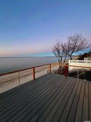 summer on the Beach, with new extended decks on the first and 2nd level , new bathrooms . 3 bedrooms 2 baths , outdoor shower central air , this what a vacation is all about.