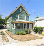 Nestled in the serene neighborhood of Lawrence, NY, 241 John St. boasts a spacious and inviting home with ample amenities. This charming residence features a sprawling backyard and an expansive lot measuring 50 x 129, providing abundant space for outdoor activities and relaxation. The interior offers three bedrooms, including a partially finished basement with a separate entrance and an additional bedroom, complemented by a convenient full bath and a half bath. Within, residents enjoy the convenience of in-house laundry facilities, a cozy dining room, and a comfortable living room ideal for gatherings. Completing the picture, a pull-out stair attic provides additional storage space, making this property a haven of comfort and practicality. Walking distance for KMH.