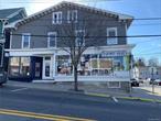 This is a well-kept building in a prime location on Main Street with high pedestrian traffic. The building has three tenants on the first floor: a chiropractor, a retail shop and a T-shirt store, each with their own bathrooms. The second floor has five office spaces with a common bathroom in the hallway. The roof is newer, and the exterior has been painted. This is a great opportunity to invest in the growing village in the town of Northeast., ROOF:Asphalt Shingles, BusIncld:No, FOUNDATION:Concrete, Stone, Number of tenants:8, Number of Restrooms:4, FLOORING:Wood, Current Use:GENERAL RETAIL, DOCUMENTS:Leases