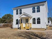 Introducing A Brand New Colonial Set On A Half Acre Blank Canvas For Your Dream Backyard- Surrounded By All Great Amenities Such As Shopping, Beaches, Parks, Restaurants, Farm-Stands, Schools, LI Railroad & So Much More. Immerse Yourself In Modern Comfort With Beautiful Custom Cabinets And Matching Quartz Countertops. This Home Offers An Elegant Flow Of Living Space With An Efficient Kitchen Combining A Center Island In Addition To An Eating Area, Formal Dining Room Plus Formal Living Room To Accommodate Your Family & Friends For Those Special Occasions. The Laundry Area Is Located Conveniently On The First Floor Joined With A Half Bath. As You Make Your Way To The Second Floor You Will Find All Good Size Bedrooms With Neutral Color Carpeting. The Primary Bedroom Provides A Walk In Closet And Full Bathroom With Double Sinks, Adjoining Other Two Bedrooms You Will Find The Second Full Bathroom. Enjoy Individual Comfort In Every Room With Mini Split Heating & Cooling To Make Your Home Very Energy Efficient. The Comfortable Size Basement With Outside Entrance Makes This A Dream For All Your Indoor Hobbies Or Even A Home Office & Gym. Construction Will Start This April, So You Can Enjoy Your Brand New Home In Time For This Summer. Taxes Are To Be Assessed & Customary New Build Fees Apply At Closing. Schedule A Showing To View The Model. Nothing Is Better Then A Brand New Construction Home From The Foundation Up!