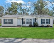 Welcome Home to Foxwood Village in Calverton! A 55+ community that offers lots of amenities including clubhouse and in ground pool. This home has a spacious open floor concept with large living room and dining room area. Flooring is durable vinyl flooring. The kitchen has plenty of counter space and cabinets for storage. Home also has a separate laundry room with outside entrance. In the warmer months you can relax on the back patio and enjoy the private scenery or meet your neighbors at the pool. This community is close to shops, wineries, restaurants, downtown Riverhead and farm stands. (All potential buyers are subject to approval by management company. Monthly fee of $776.00 includes water, garbage/snow removal, clubhouse and pool.)