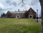 Beautiful former school building now owner occupied. Two offices with own bathroom, plenty of parking, utilities included. Easy access to highways and metro north.