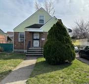 Full Brick beautiful Cape house located in Elmont. Living Room, Dining room, Kitchen, 4 Bedrooms and 3 Full bath and attached Garage. Full Finished Basement, Laundry room with OSE. Hardwood floors, New Heating unit and hot water tank. Close to Schools, Shopping center and Public Transportations.