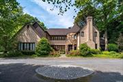 Luxury abounds at this 5-bedroom French Normandy Manor Home set on 4.1 perfectly manicured acres with beautiful specimen trees and perennials. Large and naturally sunny, newly renovated eat-in chef&rsquo;s Kitchen boasts top of the line appliances & double islands. Spacious Dining Room with Fireplace perfect for large gatherings. Handsome wood paneled Den/Office with Fireplace. Chic Family Room with fireplace and Wet Bar features French doors leading to bluestone patio. Impressive vaulted/beamed ceiling Living Room with Fireplace.Wonderful Primary Ensuite w/ Entry Vestibule, Sitting Room, Balcony & FP. All bedrooms Ensuite. Central Vac. Hard Tru Tennis Court. Inground Gunite Saltwater Pool w/ Waterfall & Baby Pool. Pool House w/ Summer Kitchen. Renovated Carriage Apartment Above 3-Car Detached Garage. Full House Generator. Outdoor Gas Firepit. High Ceilings Throughout. Entertainer&rsquo;s Dream! Enjoy Lattingtown Beach Rights Which Is Close By!