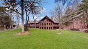 Over 30 acres of picturesque property with a pond, grazing areas for farm animals, wooded areas for hiking, and a large backyard. This property has it all. The magnificent great room has a wall of windows overlooking the expansive lawns. Screened-in deck with serene views and access to wrap around deck which was re-stained. Large eat-in-kitchen with a center island. First floor primary bedroom with full bath en-suite and walk-in-closet. The walkout lower level is over 2, 000 square feet that is not included in the total square footage. Lower level has so many possibilities with plumbing in place for another bathroom. NEW well pump system. First floor laundry room with new washing machine. Arlington School District.