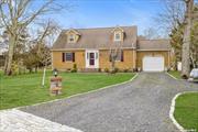 Kayak, paddleboard, explore James Creek and Peconic Bay from your own backyard! Creekfront 4 bedroom 2 bath cape, 80 feet of waterfront. Living room with fireplace, and dining room, with views of the creek and wildlife. Sliders to deck and patio. There are also 2 bedrooms and a full bath on the main floor, and kitchen with granite countertops. Upstairs you&rsquo;ll find two additional spacious bedrooms, and a full bath. These could also be used a large primary bedroom en suite with sitting/dressing room. Second floor balcony offers panoramic views of the creeks and nighttime stargazing. There is a full basement accessed from inside the home or Bilco doors, which make it simple to store your summer outdoor furniture. Hardwood floors throughout the home, ductless AC, 1 car attached garage, and a 1st floor laundry. Located a short distance from Strongs Marina, Love Lane, restaurants, shopping, vineyards, breweries and all the North Fork offers. It&rsquo;s the ideal vacation getaway or year round home!