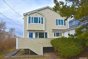 GOT KAYAK? CANOE? ...What a Spot! Smack Dab Bay Front...This is a Lovely Mostly One Level Home Right off the Main Dune Road in Westhampton Dunes.....All One Level Except Prime Suite on 2nd Level for Ultimate Privacy....Jr Primary on First Floor too....Open Layout...New Kitchen and Renovated 4 Bedrooms with 3 Baths...Close to Cupsogue for Life Guard , Snack Bar and Bands for Fun! Main Street Westhapton Beach Close By with Its Shops, Houses of Worship, Farmers Market, Restaurants , Theaters and More! Jitney There Too! Private Bay Beach on the Bay Right Off the Deck onto the Sand...Just Curl Those Toes....Thanks for Looking ...Come on Out!!!!! Available Summer 2025