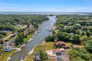 Beautiful 2 Bedroom 2.5 Bath Home on the water in Center Moriches. Your own private boaters paradise. Room for up to 40 Ft motor yacht on Orchard Creek leading out to Moriches Bay and the Great South Bay. The home comes equipped with a mint meticulously maintained 24&rsquo; Walk Around Robalo w/ 225 Mercury (See Photos), 2 kayaks and a paddle boat! The home is fully renovated top to bottom, in between, inside and out. It has many features both to catch the eye and warm your feet. It includes energy efficient updated heating and cooling systems and appliances. The home&rsquo;s underside is wrapped, with a new vapor/moisture barrier and insulated. The bulkhead has been renovated as well. The elevated yard with a new beautiful masonry path which meanders to the dock from your new decking that surrounds most of the home. Perfect for entertaining, flowing from the interior areas via new Andersen sliding doors which gives fantastic water views to the people inside. The mini-community will be receiving new paving and landscaping which will increase the value. Ready to move in.