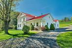 Welcome to this charming gentleman&rsquo;s farm, nestled on 125 peaceful acres. This property includes a well-kept 3-bedroom, 2-bath home, a fully insulated 3-bay garage with heated bays and a stone-floored cold storage area, plus a 5, 000-gallon spring-fed water system supported by three drilled wells. The expansive barn offers a drive-in hay mow, workshop, generator hookup, and plenty of equipment storage.