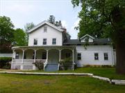 Tax records indicate the original home was built in 1927. Since then the home has been added onto to accommodate the growth of the present use of the Unitarian Universalist Fellowship of Poughkeepsie. The building sets on 1.6 acres and is presently zoned 614 Special Schools. There is a 2 car detached garage. The property presently is tax exempt, therefore no taxes are shown. Possible Zoning changes would have to be met for any additional usage. The sq. ft is approximately 7, 400 and has a third level attic that is not included in the sq. ft. Many original features are in the main part of the house as well as a labyrinth garden area. Electric was updated in 2018. 4 gas steam zone system as well as 2 hot water heat zones. Roof with shingles 2018. New membrane on flat areas 2016. Municipal water and sewer and natural gas. Two kitchens, 3 full usable baths. Some original hardwood floors. Large great room that is used as their meeting room.