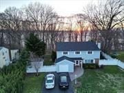 The gem of Morgan Park Estates on the &rsquo;Gold Coast&rsquo; of Long Island. This split-level house embodies comfort, modernity, and water views. The heart of this home is its customized Cambridge kitchen, renovated in 2013, where functionality meets elegance. The customized chandeliers, backsplash, and double-layer luxurious marble countertops create a space where culinary creativity can flourish. The cozy living room invites relaxation and intimate gatherings, while the family room, with its warm wood-burning stove. Four well-appointed bedrooms offer ample space for family and guests alike. The house actually has 2 masters, the original master is on the second floor, and the current master was added in 2003! The 2.5 bathrooms are thoughtfully designed, ensuring convenience and privacy. The full basement presents endless possibilities for customization - a playroom, home gym, or additional storage space. The attached one-car garage adds to the convenience, ensuring your vehicle or outdoor gear is stored securely. The giant patio provides a perfect entertaining space, and the private backyard has 100 percent privacy in summer and also amazing views of sunsets in winter! The location is unrivaled, with the tranquility of a park, the educational opportunities of nearby schools, and the social and recreational activities at the Glen Cove Yacht Club all within walking distance.