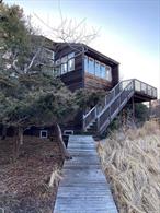 This Home is Available To Rent For Month of July $35, 000. Fire Island is a vacation destination. Lovely four bedroom, two bathroom Seaview home in GREAT location offers a ton of light and plenty of room for ALL! Close to the beach and ferry. Seaview Amenities: Bay beach, Kiddy pool, Playground and, a Tennis and Basketball court for your enjoyment.There is also access to Bay Beach Amenities with an additional fee.