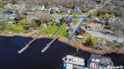 Seafarers Safe Haven! Vast Vistas on the Peconic River Widest Point Is Visually Inspiring. Deep Water Docking w/Fixed Dock, Bridge & 32&rsquo; Floater, Includes Water & Electrics. One Family Ownership Spans Generations For This Cared-For Legal 2 Family Home Throughout These Many Years. Whether You Want to Convert to a Single Family Home or Stay As Is, The Investment is Well Grounded. Riverheads&rsquo; Gentrification Grows Yearly with Theatre Happenings, Art Events, Restaurants, Waterfront Affairs & The Developing Town Square Are All Within a Hop, Skip and Jump. Perfectly Centered Between 2 Forks Makes For Easy Access & Experiencing The Best Of Both North & South Forks! If Golf is Your Game... Indian Island County Course is Just Around the Corner, It&rsquo;s Neighboring 200 Acre County Park Features Both Sandy Beach and Wooded Hiking Trails. A Beautiful Setting.