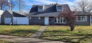 Welcome to this stunningly updated Expanded cape in the heart of Levittown. Located in a desirable neighborhood, this home offers a classic charm. Step inside and be greeted by the formal living room, ideal for hosting guests or relaxing with family. The eat-in kitchen features Quartz countertops, stainless steel appliances. This home boasts Five bedrooms and two Full bathrooms. The driveway leads to a spacious detached One-car garage, providing ample parking and storage space. Schedule a showing today and make it yours!