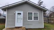 Renovated 1 bedroom home with super low taxes with large fenced in property! Room to build a garage, not in a flood zone, newly painted, new flooring, new gas stove, cathedral ceilings in living room, shed for storage, and more! Low taxes do not reflect star exemption! Be the 1st!