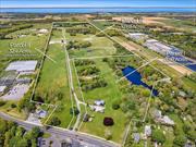 Nestled within the picturesque landscapes of the East End of Long Island, 162 acres encompasses the North Fork&rsquo;s largest commercially operating equestrian training & boarding facility. Originally founded by the Entenmann Family, The property encompasses 3 parcels including 51+ Developable Acres. Positioned at the core of the estate stands a modest yet inviting home, offering four bedrooms and two bathrooms, alongside a quaint cottage designated for the farm&rsquo;s watchman. The esteemed property boasts rolling paddocks throughout the tract, two ponds, several boarding barns, workshops and detached structures. It features a half mile race track, in addition to two outdoor riding arenas. The indoor riding arena provides the necessary infrastructure to ride, train and retire horses of the highest caliber within this unparalleled equestrian sanctuary. The farm boasts three separate boarding stables with 90+ boarding stalls.