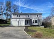 Welcome to 7 Dogwood lane! A traditional colonial with everything you could hope for! Located in the Harbor View neighborhood of Glen Head, this home hits all the marks! 4 bedrooms and 2.5 bathrooms with laundry located on the second floor! The first floor walks into your formal living space, flowing into your dining area and then into your kitchen. This completely renovated EIK kitchen boasts granite countertops with waterfall edges, brand new appliances and cabinets and provides access to your backyard patio to make hosting indoor and outdoor entertainment seamless and easy! Make your way into the cozy yet spacious den that boasts a brick fireplace and back sliding door that also goes to the patio! You also have a 2 car attached garage. Lastly, Make your way to the fully finished walkout basement that has endless possibilities!