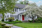 Wonderful center hall colonial located in the Village of Millbrook. Built in 1930, this traditional home boasts many original details: wood moldings, doors, and refinished oak flooring throughout. The interior offers well-proportioned, light-filled rooms, including a living room with a wood burning fireplace and French doors that open to a sunroom. There is a formal dining room and stylish galley kitchen. The first floor bathroom, with stall shower, and second floor full bathroom have original tile work with updated lighting and fixtures. The second floor consists of a primary bedroom and three additional bedrooms. The walk-up attic provides ample storage, as does the full basement. Outside, there is a flagstone patio overlooking a level, landscaped yard with perennial gardens, flowering trees and shrubs. The property includes a detached two-car garage and a storage shed. Conveniently located a short walk to restaurants, shopping, tennis courts, the library, and park.