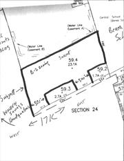 High Visibility location on Route 17K next to Bank Headquarters. Zoning B-2 Community Commercial, all maps and zoning attached to this listing. Full survey, engineering and site plan also from 2002 for a 24, 000 sq ft on story building. Wetlands delineation done too. 371 ft and 300 ft road frontage separated by a smaller lot, see red survey tapes. Zoning has changes somewhat since 2002.