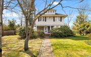 Step back in time to this gorgeous 1908 Glen Cove Victorian. This beautifully crafted residence is ready to be restored to its original splendor and offers an ideal opportunity to own a piece of architectural heritage,  As you approach the front door, you are welcomed by a large porch - the perfect spot to enjoy a leisurely afternoon. Inside the home, you enter a welcoming foyer with an ornate fireplace. The living room and dining room is adorned with amazing details such as high ceilings and original inlaid wood floors. The craftsmanship is evident in every detail, reflecting on a time when homes were built with an unwavering commitment to beauty and quality. The second floor feature 4 light-filled bedrooms, all with large windows, and a full hall bath. Study, home office space and tons of closet space. The basement and attic provide ample space for storage or the opportunity to expand and customize to suit your needs. Through the eat in kitchen you will find the back entrance of the home, leading to an expansive backyard ideal for entertaining, and a detached two car garage situated on a ? acre featuring a brick patio and pre-built area to have an outdoor sports court. Immerse yourself in the charm, character, and potential of this classic beauty.