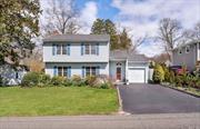 Charming 4 bedroom 3 bath colonial on flat fenced property, just outside Huntington Village. This house was rebuilt in 1990, with many updates since. Including updated roof, cesspool, sliders to patio and beautifully landscaped yard with mature plantings, 200 amp electrical box, 3 zone heat, full basement with OSE, 7 zone IGS