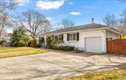 GREAT LOCATION, corner lot, Harborfields SD#6 (Blue Ribbon School). Kitchen w/ss appliances. Living room with fp & vaulted ceiling. Hardwood floors, full finished basement. Anderson windows, 200 amp electric. Fully fenced, trellis covered patio, semi inground heated pool with wrap around deck & new liner. Large shed.