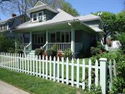 This charming, craftsman-style colonial boasts a renovated kitchen and bath, showcasing three bedrooms and one bath, complemented by gorgeous hardwood floors throughout. Step outside to a lush, landscaped private fenced-in yard, complete with two stone patios and a fantastic front porch, perfect for entertaining guests. The full basement offers laundry and ample storage space. Conveniently located close to houses of worship, restaurants, schools, and close to the train. Enjoy the comfort of a new AC unit in the living room and a single-car garage with an additional off-street parking spot. Pets may be considered.